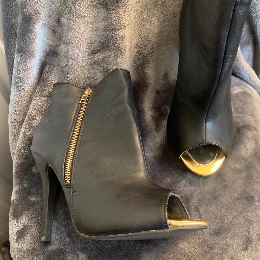 Mark and Maddux black leather Ankle boots w/ gold